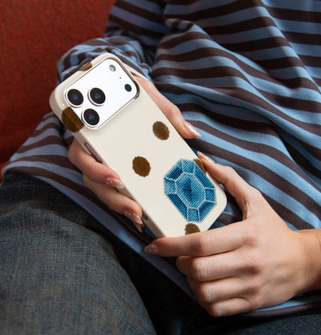 woman holding the best iPhone 17 Pro Max case MagSafe with a stylish design